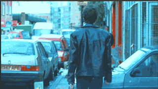 Richard Ashcroft walks over a car's bonnet in The Verve's music video for Bittersweet Symphony